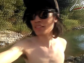 Jon arteen is this slim asian twink boy dancing a musical strip-tease on the river smiling showing his full pubes doing outdoor gay porn with a sneaker and underwear fetish